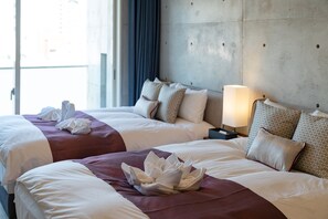 Premium bedding, laptop workspace, blackout curtains, free WiFi