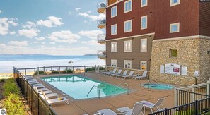 Outdoor pool, a heated pool - Beachy Condo with Pool & Hot Tub (Traverse City)