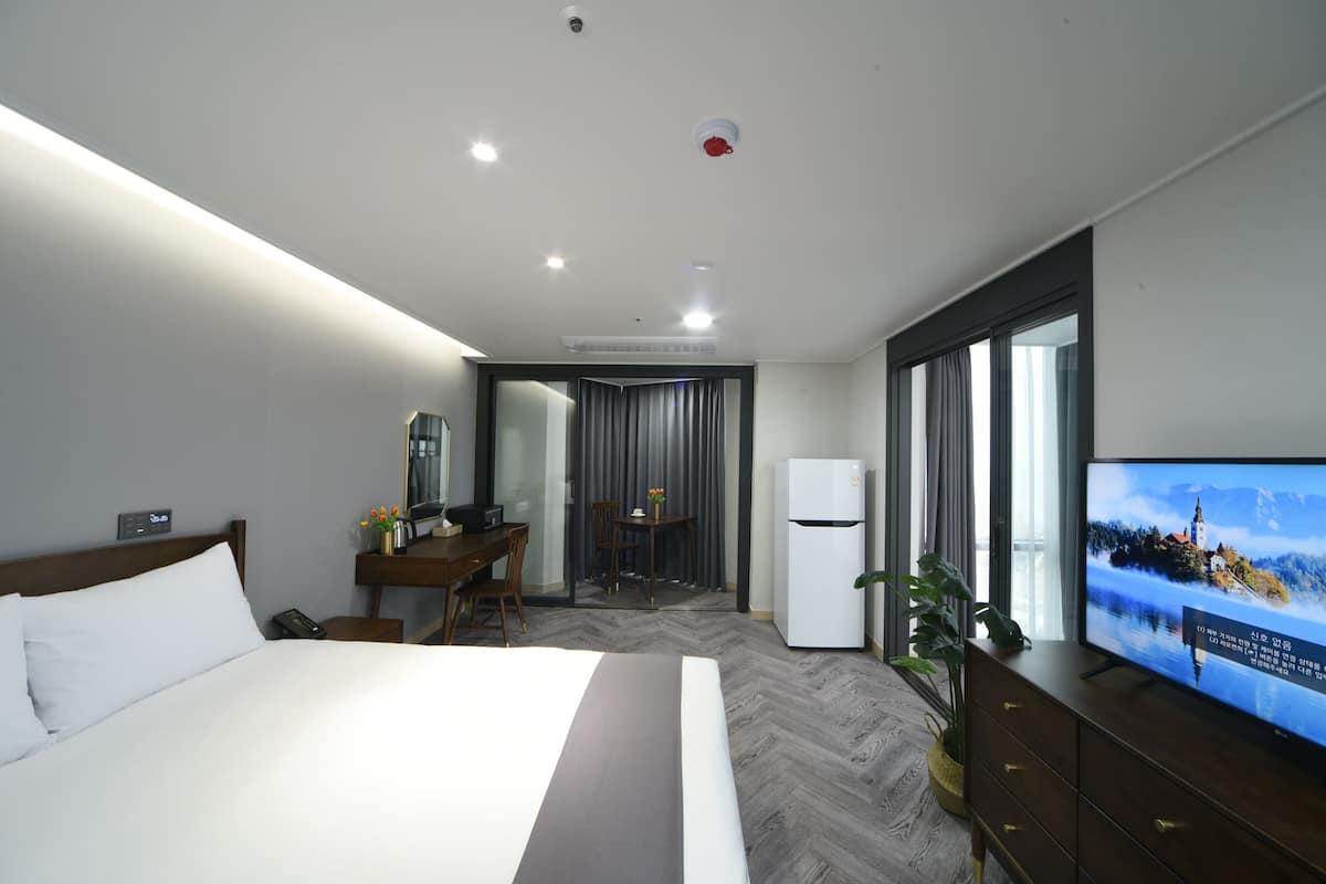 1 bedroom, desk, blackout curtains, iron/ironing board