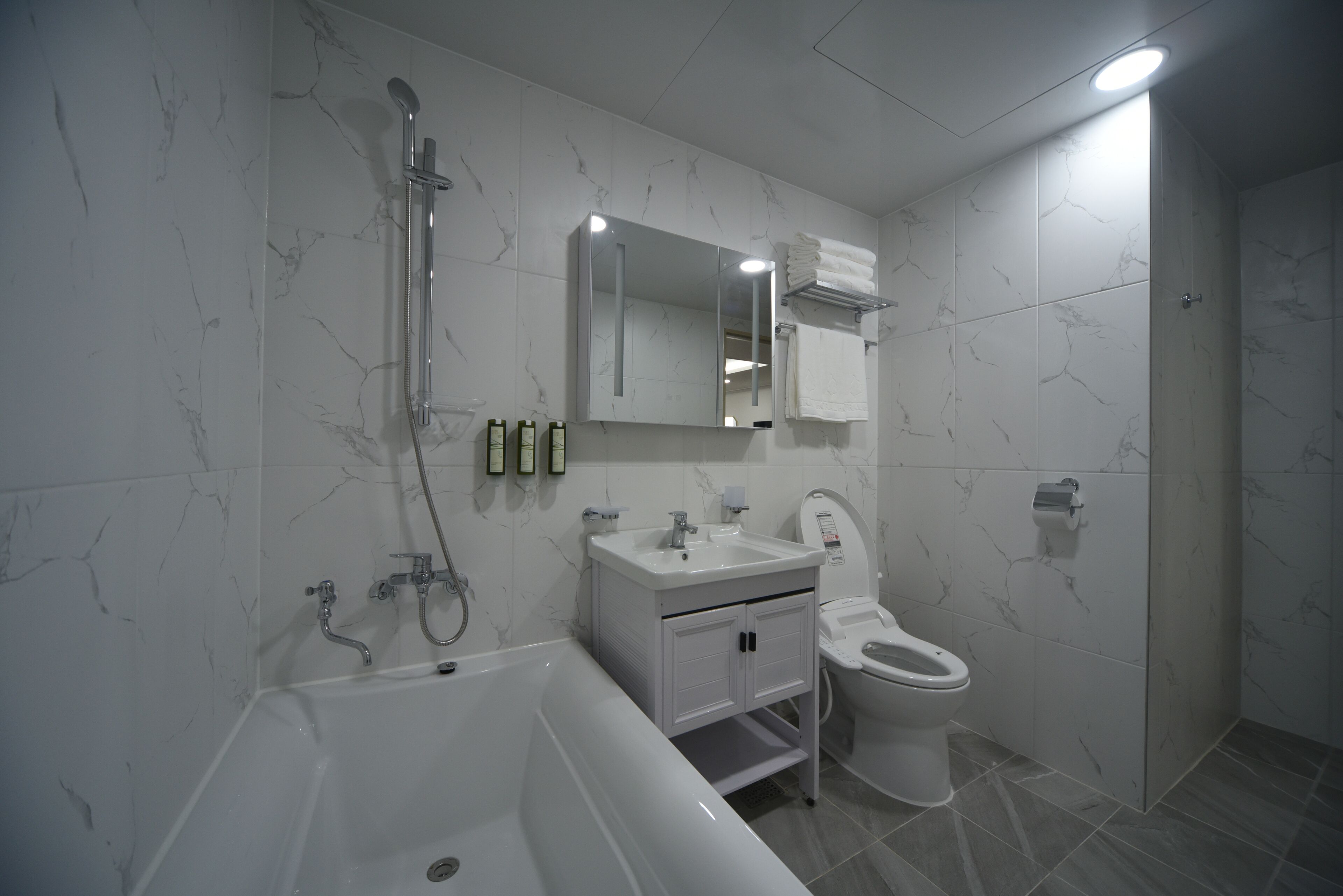 royal suite (pool access for 5) | bathroom | combined shower/bathtub, hair dryer, bathrobes, slippers