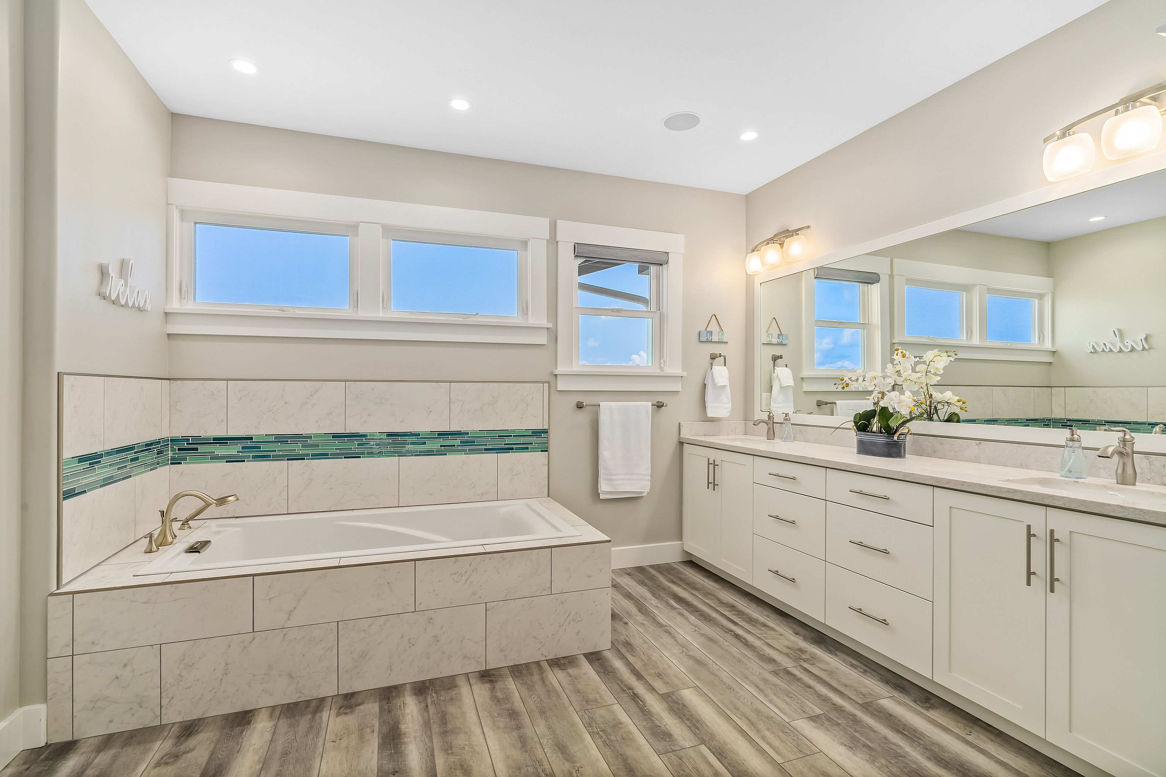 Bathtub, hair dryer, towels, soap