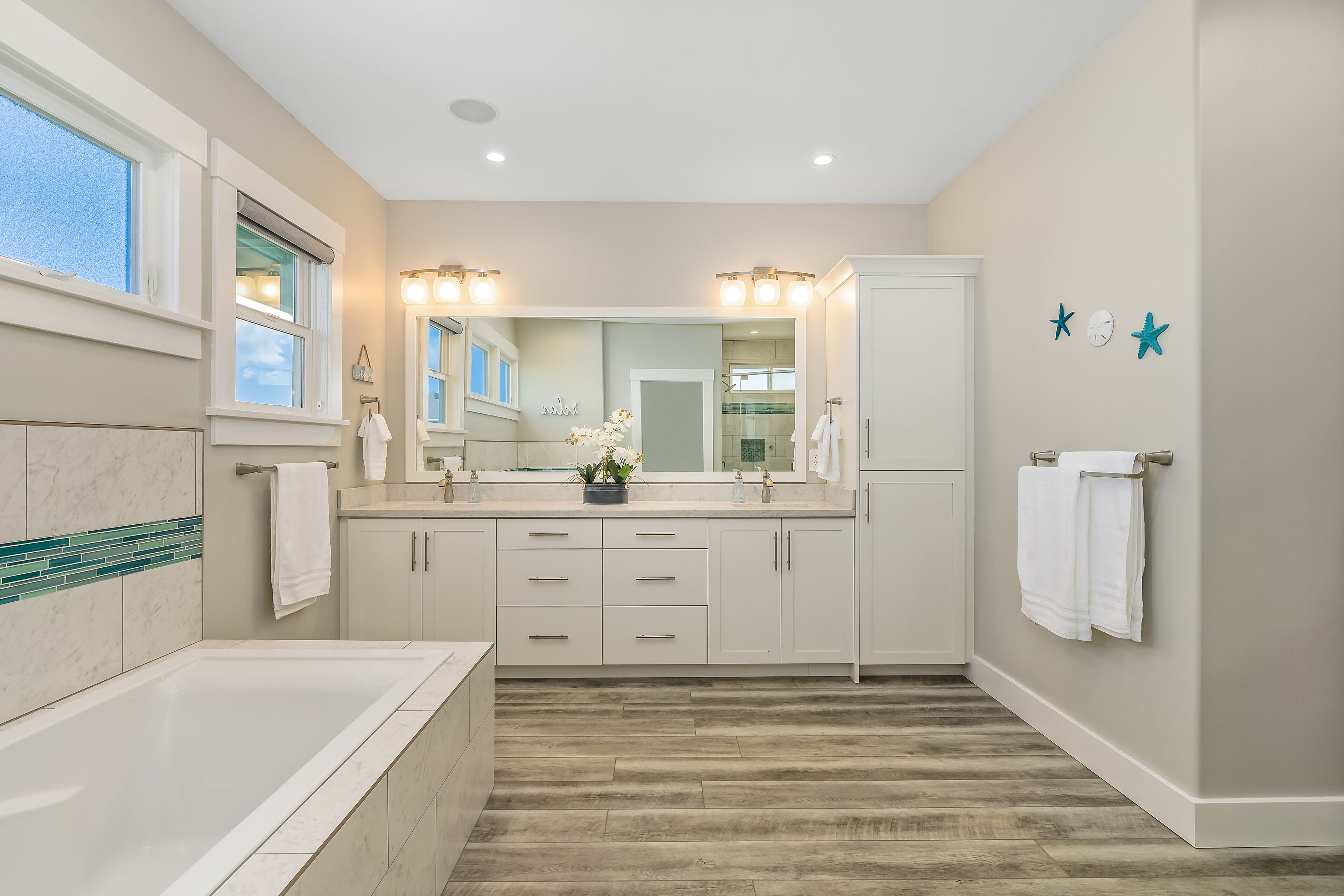 Bathtub, hair dryer, towels, soap