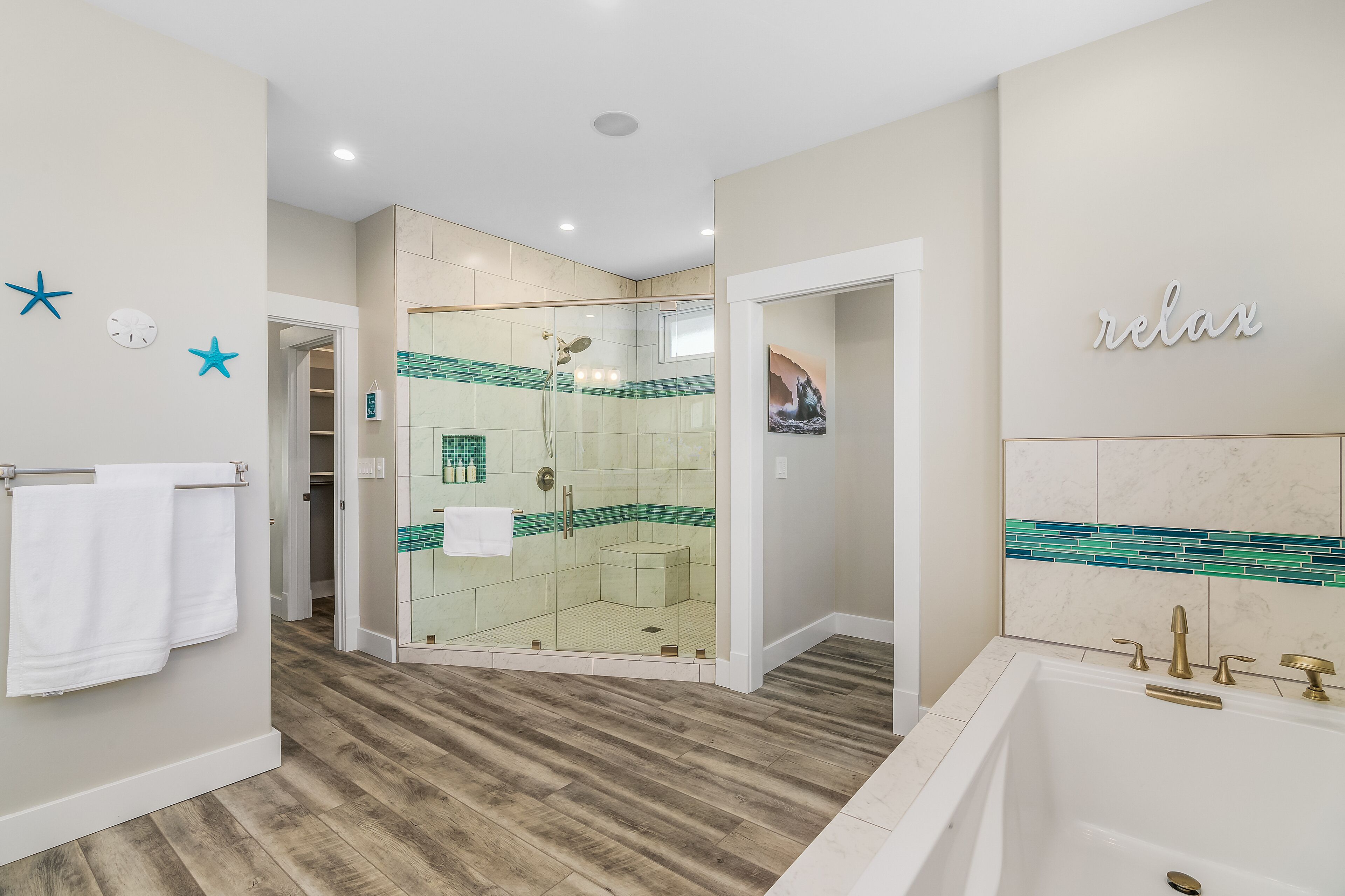 Bathtub, hair dryer, towels, soap