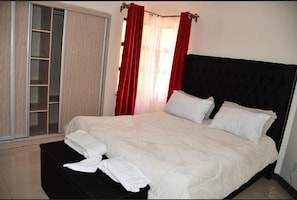 Departamento Deluxe | 2 habitaciones, escritorio, tabla de planchar con plancha y wifi gratis