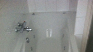 A bathtub with a faucet and a drain. - A castle a few km from here (Utrecht)