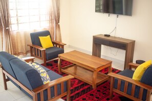 32-inch flat-screen TV with digital channels, TV - Cairo Palace Hotel (Lodwar)