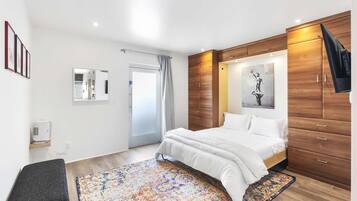 Iron/ironing board, travel crib, WiFi, bed sheets