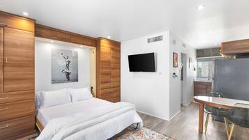 Iron/ironing board, travel crib, WiFi, bed sheets