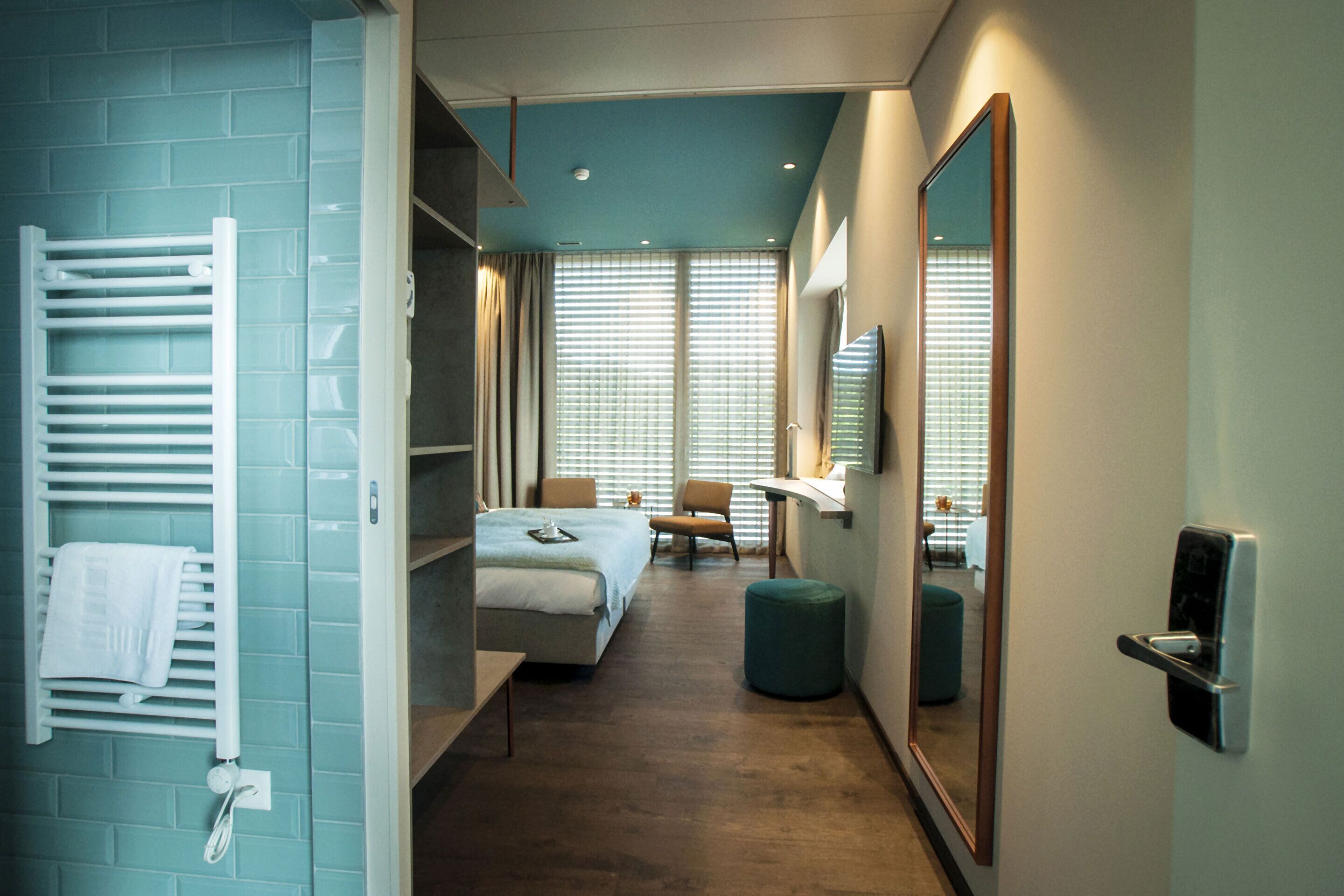 room, lake view | bathroom | shower, rainfall showerhead, designer toiletries, hair dryer