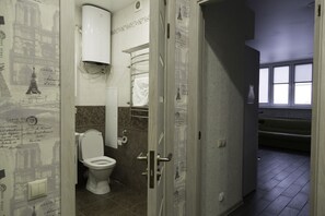 Comfort Condo | Bathroom | Shower, free toiletries, hair dryer, slippers