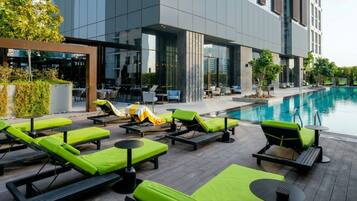 Outdoor pool, open 7:00 AM to 8:00 PM, free cabanas, pool umbrellas