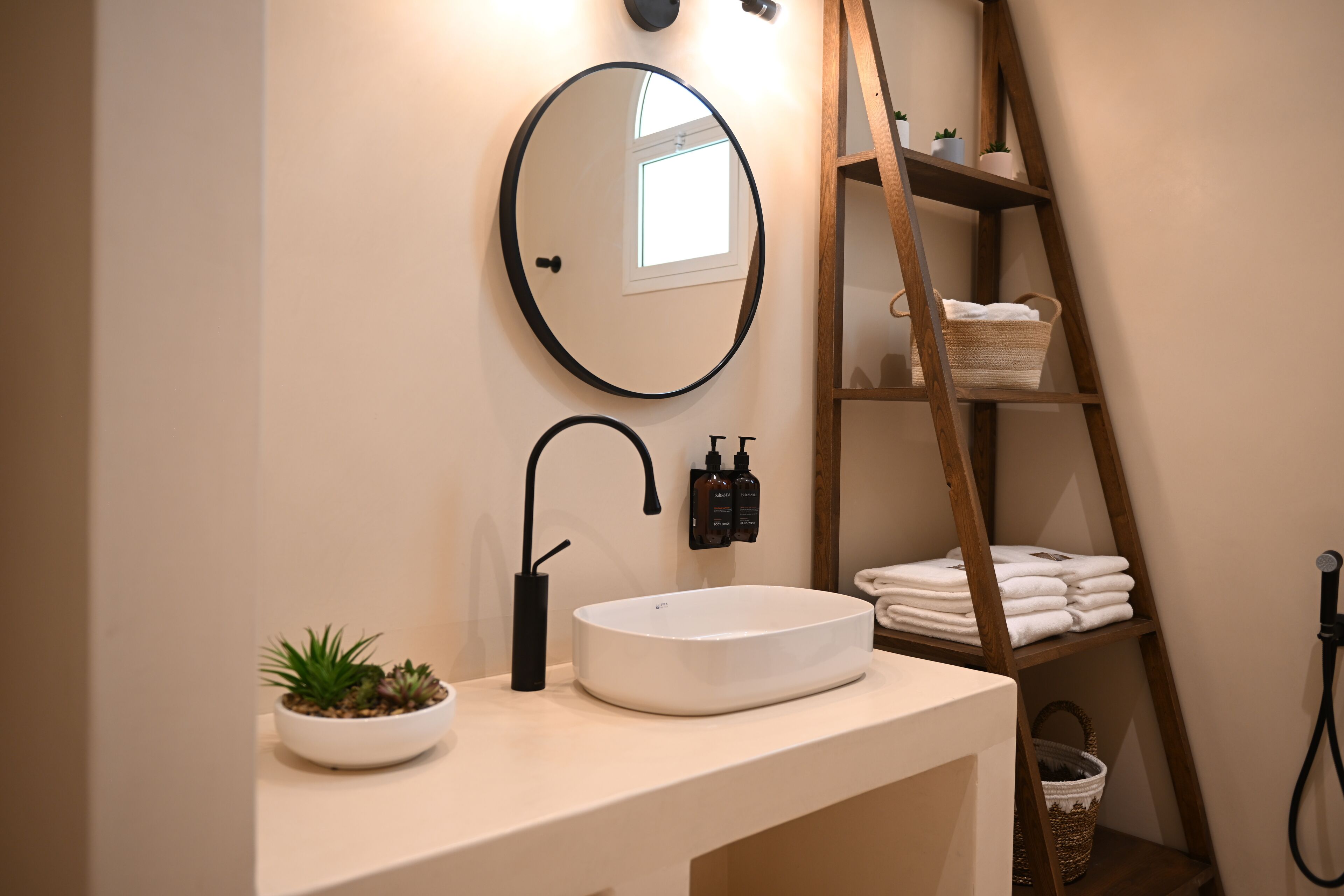 boho oasis suite | bathroom | rainfall showerhead, hair dryer, towels