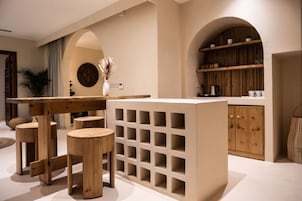 Boho Oasis Suite | Living area | 50-inch Smart TV with satellite channels, TV