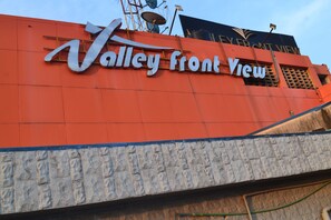 A sign for "Valley Front View" on a building. - Valley Front View Hotel (Lagos)