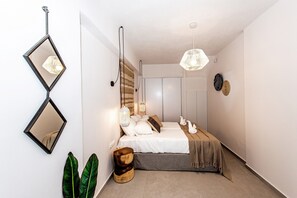 2 chambres, coffres-forts dans les chambres, fer et planche Ă repasser