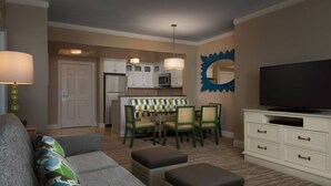 A compact living space with a kitchenette, a dining area, and a seating area. - Oceanfront Villa at Grand Dunes (Myrtle Beach)