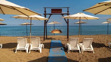 On the beach, free beach cabanas, sun loungers, beach umbrellas