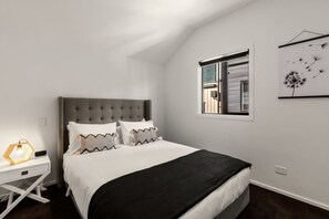 1 bedroom, desk, iron/ironing board, travel crib