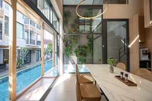 Exclusive TownHome Pool Villa | Living area | 55-inch Smart TV with digital channels - Shan Villas Sukhumvit (Bangkok)