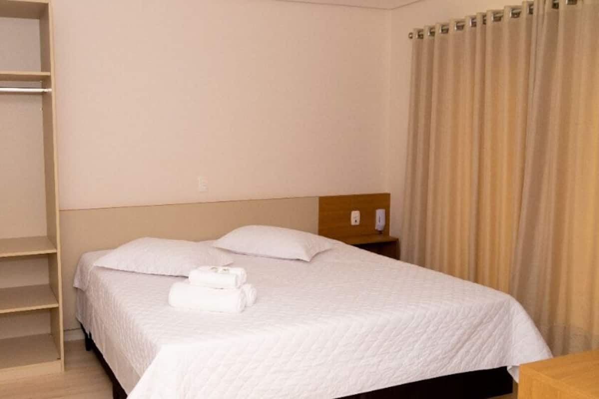 Desk, laptop workspace, free WiFi, bed sheets