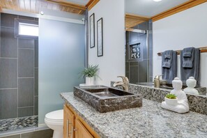 Shower, hair dryer, towels, shampoo