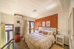 1 chambre, coffre-fort, fer et planche à repasser