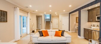 Spacious 6 Bed 5 Bath Beach Home with Elevator, Pool & Decks Steps from the Beach