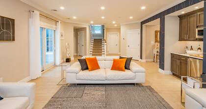 Spacious 6 Bed 5 Bath Beach Home with Elevator, Pool & Decks Steps from the Beach