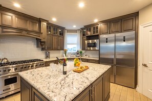 Fridge, microwave, oven, stovetop - 6 Bed 5 Bath Beach Home with Elevator, Pool & Decks Steps from the Beach (Brigantine)