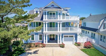 6 Bed 5 Bath Beach Home with Elevator, Pool & Decks Steps from the Beach