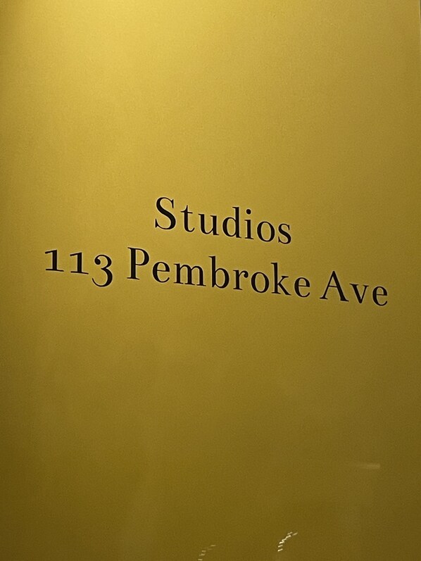 A sign with the text "Studios 113 Pembroke Ave" on a yellow background. - NEW, NEW, NEW! Wabasha downtown studio113 Pembroke Ave Unit #102 (Wabasha)