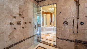 Bathtub, jetted bath, hair dryer, towels