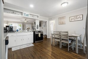 Enjoy meals in the kitchen with a dining area and central island.