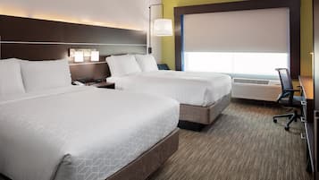 Tabla de planchar con plancha, wifi gratis y ropa de cama