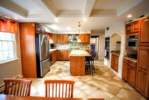Dining - Colonial style 5BR/5BA home tucked in a private, wooded setting w/pool & hot tub (Stevensville)