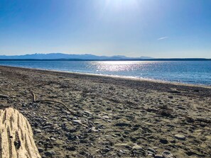 On the beach, sun-loungers, beach towels