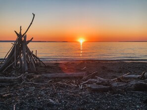 On the beach, sun-loungers, beach towels