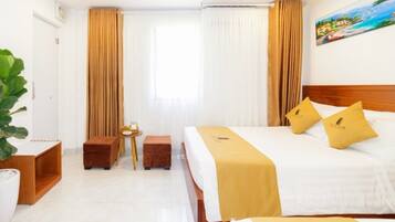 Family Room, City View | Minibar, in-room safe, desk, blackout drapes