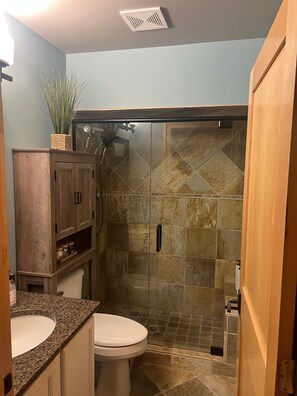 Bathtub, hair dryer, towels, soap