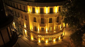 A multi-story building with balconies and a ground-level entrance. - Astoria Tbilisi (Tbilisi)