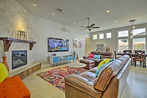 TV, fireplace, books