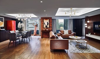 Premier Suite, 1 King Bed | Living area | 42-inch Smart TV with digital channels, TV