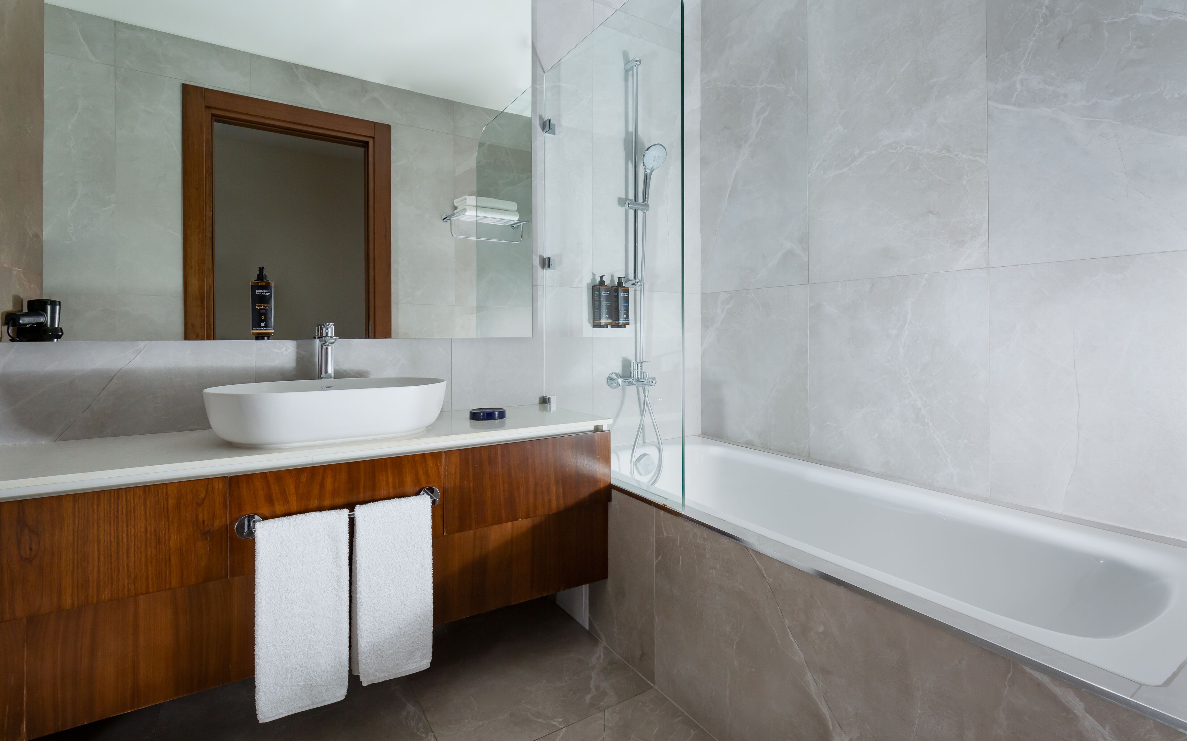 deluxe room, 1 double bed | bathroom | eco-friendly toiletries, hair dryer, dressing gowns, slippers