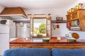 Fridge, microwave, oven, cookware/dishes/utensils