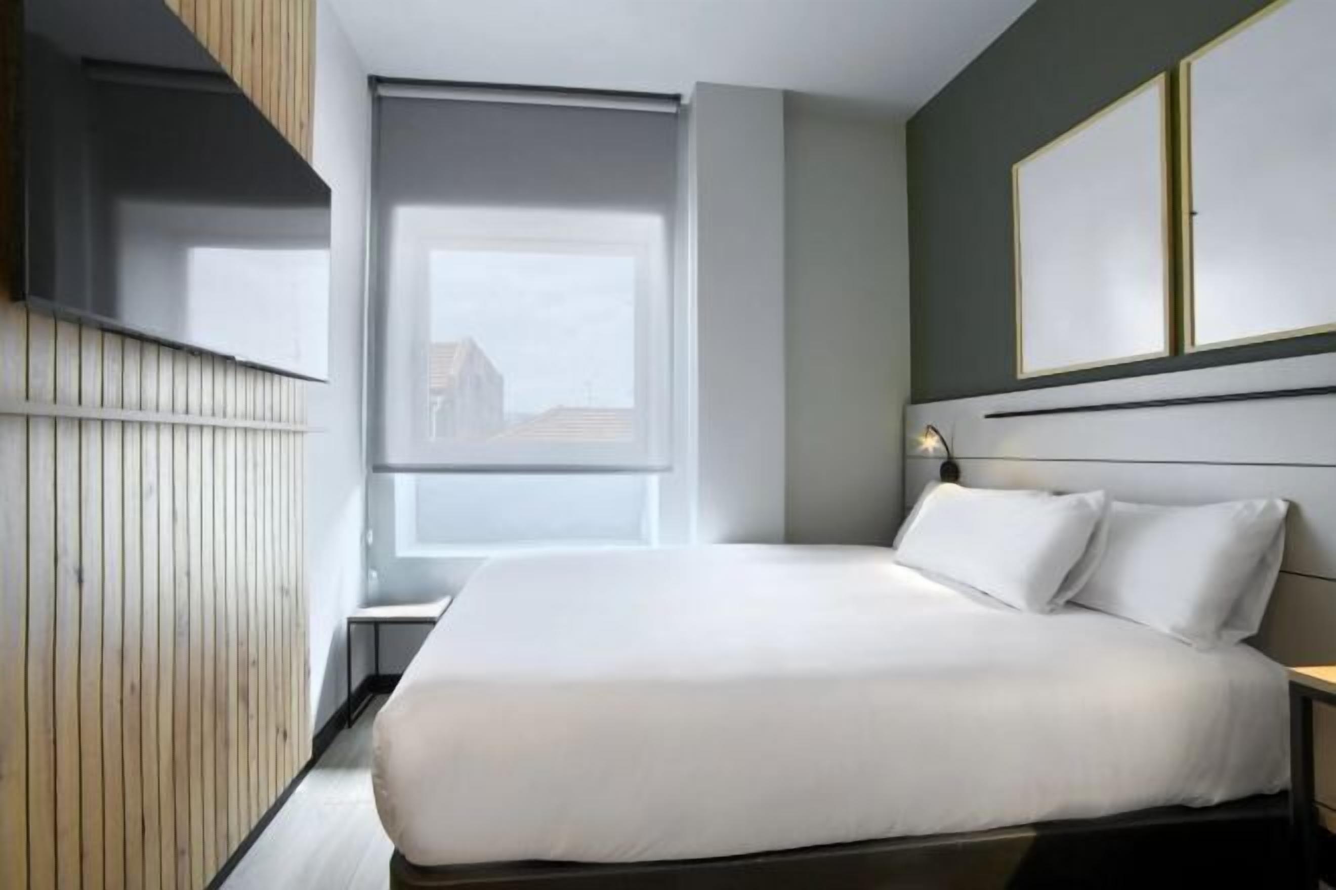 Desk, blackout curtains, soundproofing, iron/ironing board