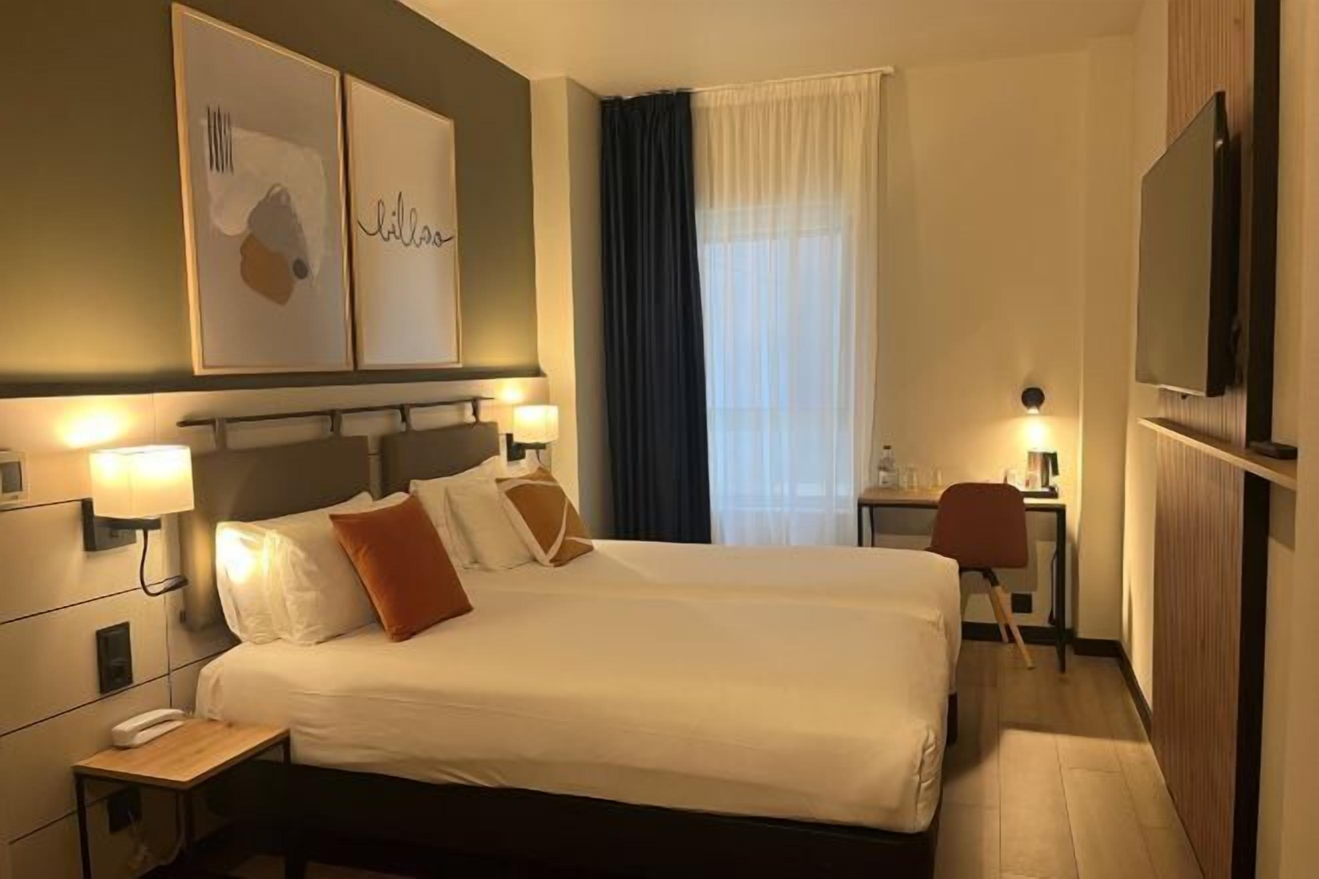 Desk, blackout curtains, soundproofing, iron/ironing board