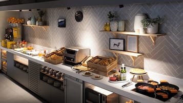 Daily buffet breakfast (EUR 14 per person)