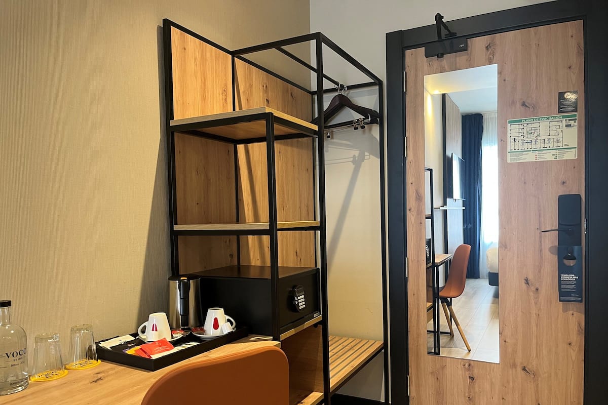 Desk, blackout curtains, soundproofing, iron/ironing board