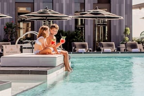 Outdoor pool, open 7:00 AM to 6:00 PM, sun loungers