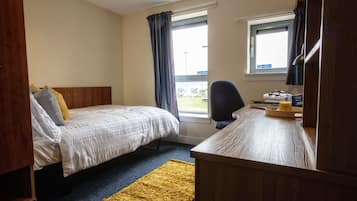 1 bedroom, desk, laptop workspace, blackout curtains